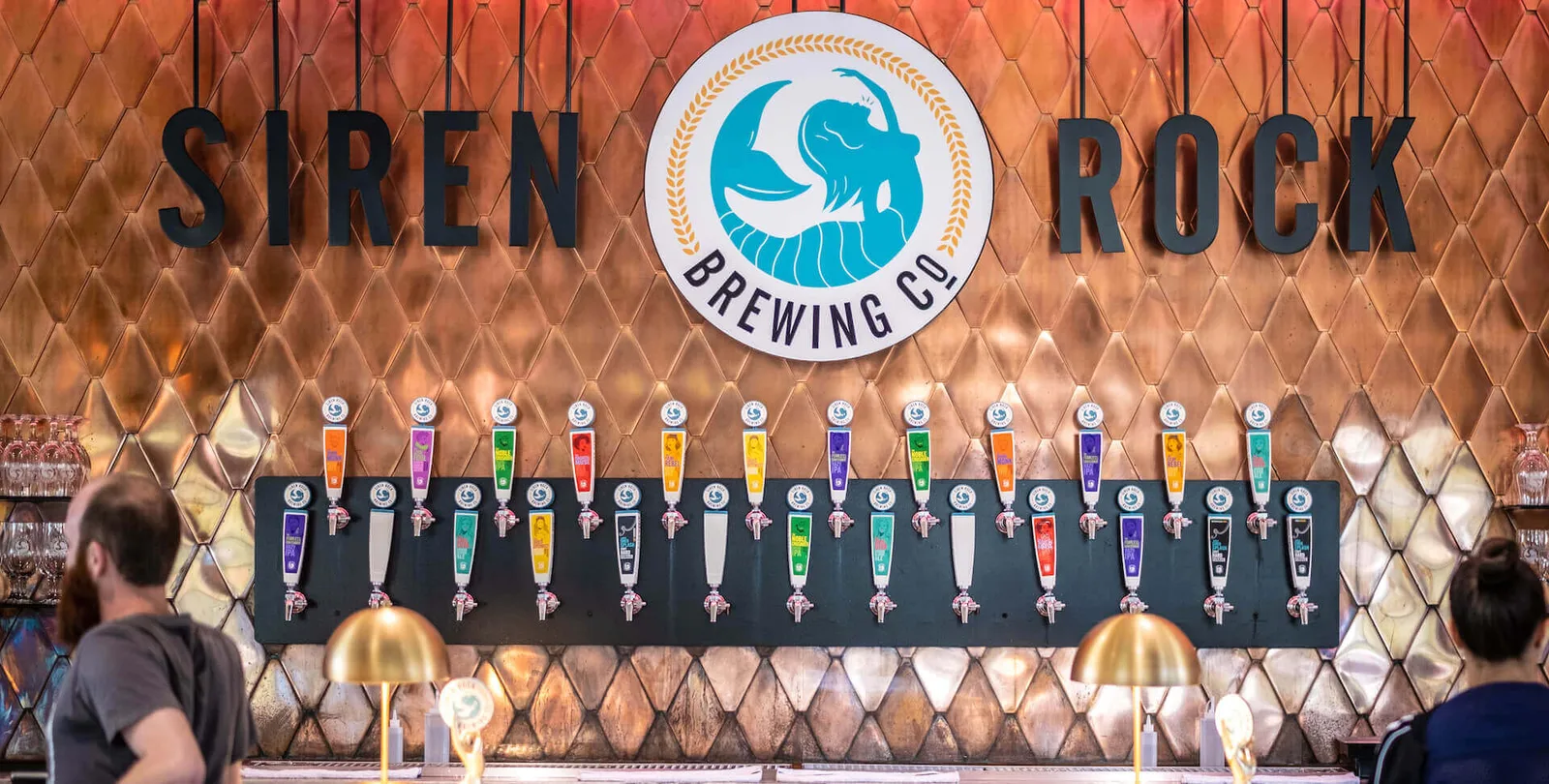 Siren Rock Brewing taproom interior and brand signage