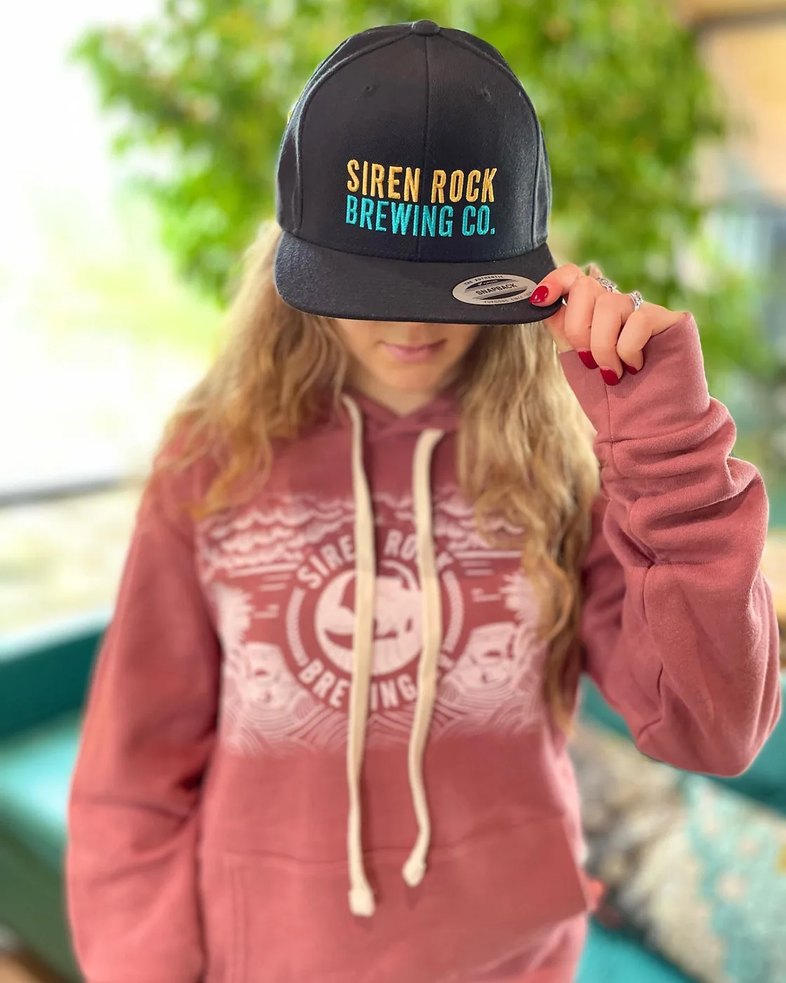 A brewery brand worn in the wild across merch