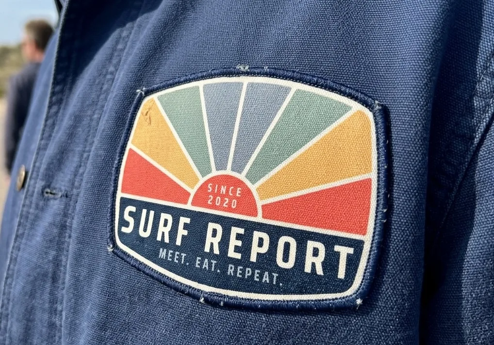 A brand patch on a uniform shirt